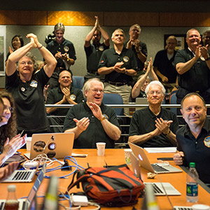 Part of the New Horizons team celebrating the spacecraft's flyby of Pluto.
